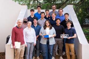 Professor Christopher Goyne stands bottom, far left, with HEDGE capstone students.
