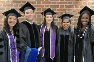 Students at a diploma ceremony during Final Exercises