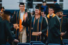 Graduating students enter the AFC