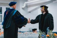 A student receives their diploma