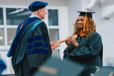 A student receives their diploma