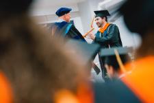 A student receives their diploma