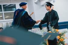 A student receives their diploma