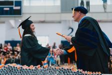 A student receives their diploma