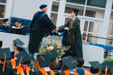 A student receives their diploma