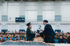 A student receives their diploma