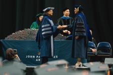 A student receives their diploma