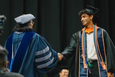 A student receives their diploma