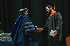 A student receives their diploma