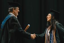 A student receives their diploma
