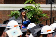 A student stands to be recognized 