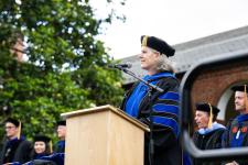 Dean West speaks during the ceremony