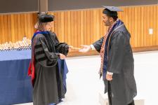 A student receives their diploma