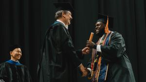 A student receives their diploma