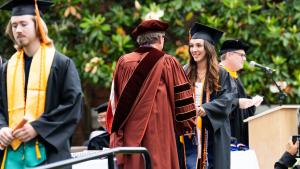 Student receives their diploma