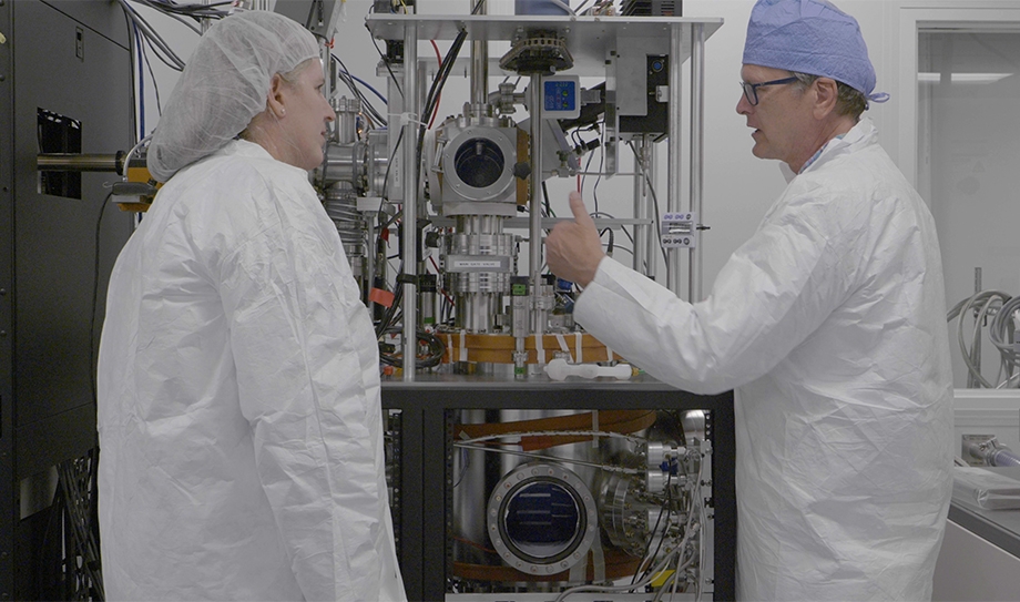 Arthur W. Lichtenberger research professor of electrical and computer engineering, leads UVA Engineering Dean Jennifer L. West on a tour of UVA's Innovations in Fabrication clean room facility.
