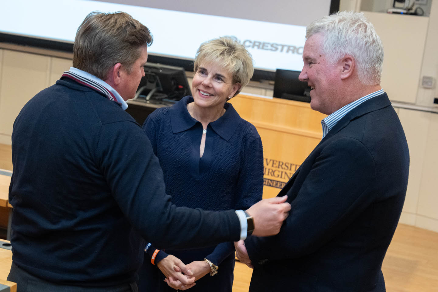 Three people talking