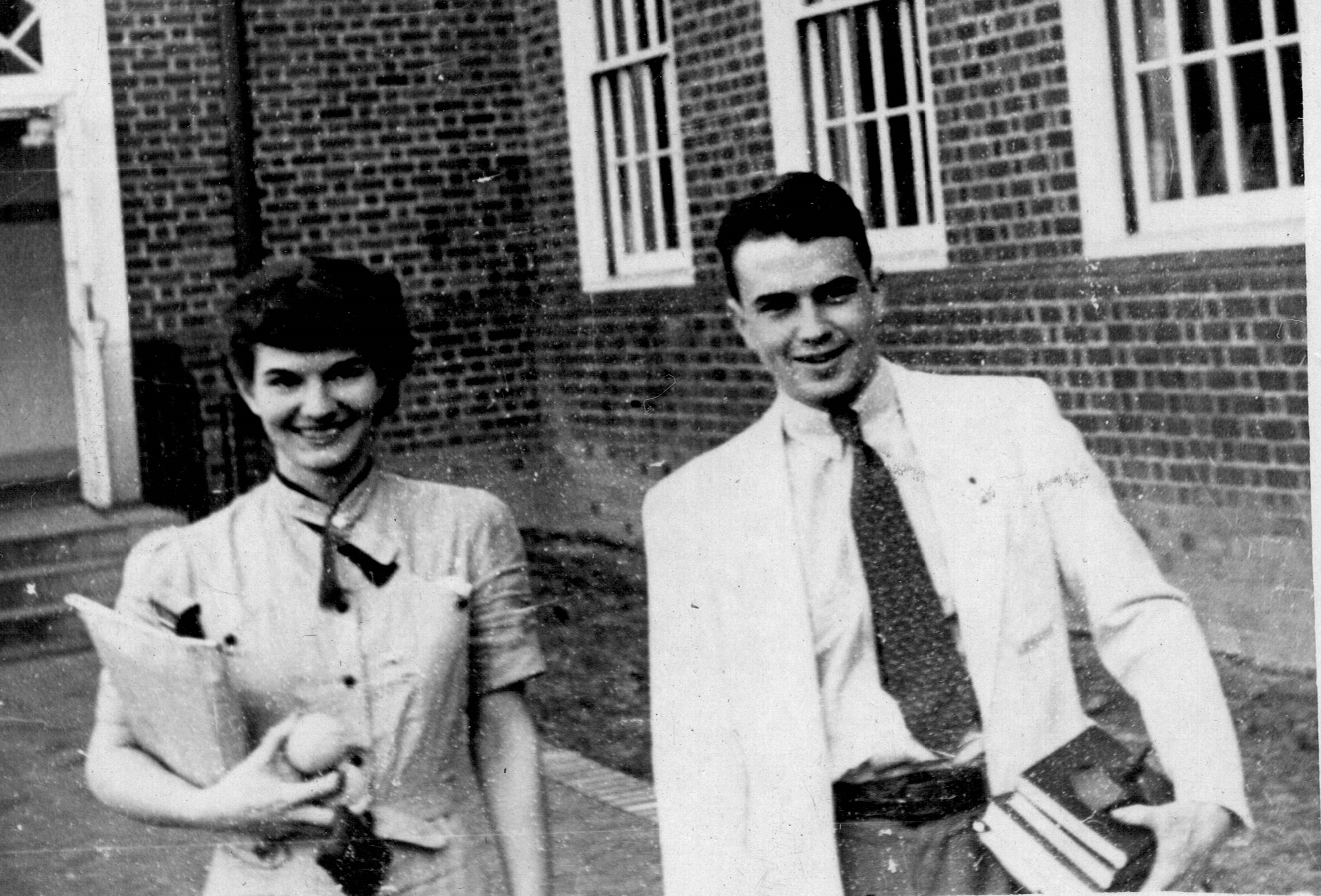 Kitty heads to class with a male student.