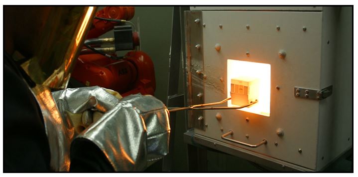 Samples being removed from the deposition furnace