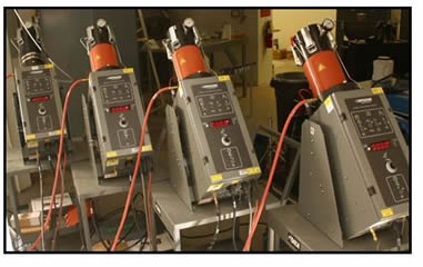 Four source powder feeders