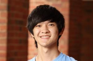 headshot of Alex 
