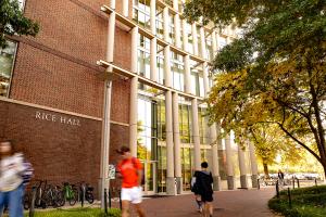 Students walking past Rice Hall