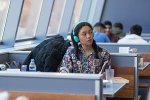 Student seated at a dining hall