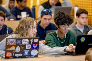 Students work together on a project in a class in Rice Hall