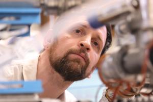 Instrument Scientist Adam Woodson working on the KEVION ICE Chamber