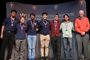 image of group on stage after winning third place at competition in Lexington