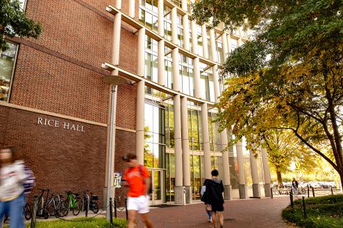 Students walking in front of Rice Hall