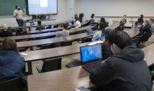 Christopher Krebs in a classroom of UVA students