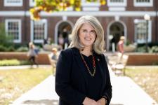Dean Jennifer L. West in front of Thornton Hall