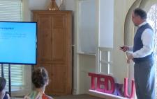 George Christ in front of audience at UVA TedX