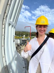 Girl with Thumb up on construction site