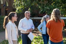 Faculty chat at picnic