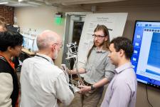 a student explains a capstone project