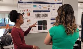Maasai Thornton presenting her research poster