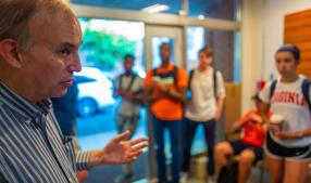 Paul Benneche talks with students